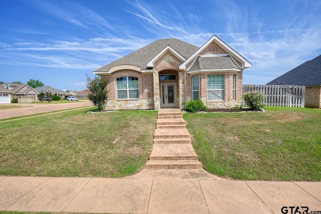 view of front facade with a front yard