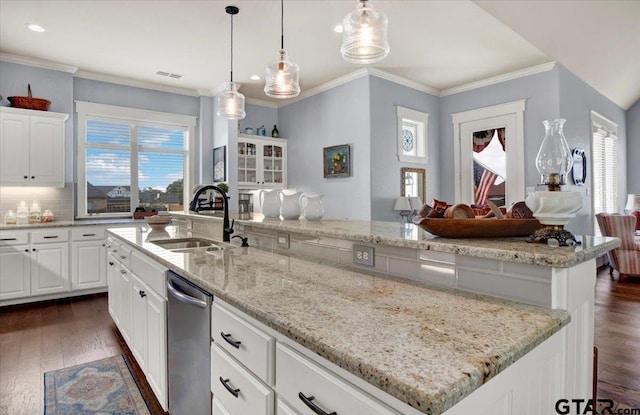 14621 Twin Pine Ln, Lindale, TX 75771 - kitchen with stainless steel dishwasher, dark wood-style floors, white cabinets, light stone counters, and hanging light fixtures