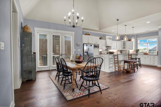14621 Twin Pine Ln, Lindale, TX 75771 - dining area with dark wood-style flooring, a chandelier, recessed lighting, high vaulted ceiling, and french doors