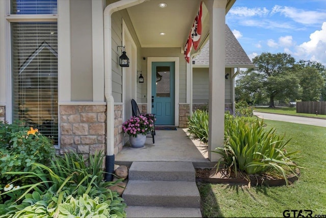 14621 Twin Pine Ln, Lindale, TX 75771 - view of exterior entry featuring stone siding and covered porch