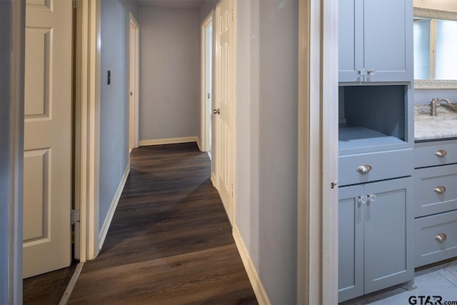 1400 Santa Rosa, Tyler, TX 75701 - hall featuring dark wood-style floors and baseboards