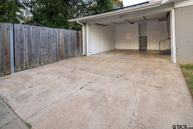 1400 Santa Rosa, Tyler, TX 75701 - garage featuring a carport and driveway