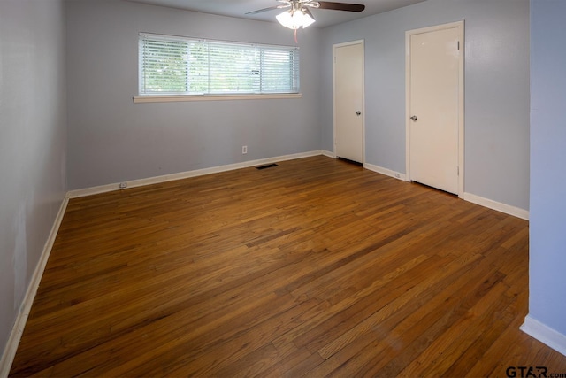 1400 Santa Rosa, Tyler, TX 75701 - unfurnished bedroom with wood finished floors and a ceiling fan