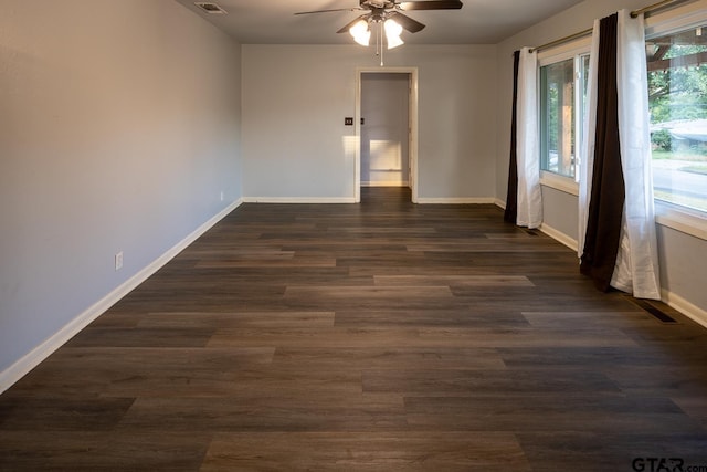 1400 Santa Rosa, Tyler, TX 75701 - spare room with a ceiling fan and dark wood-style floors