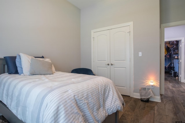 17294 Hidden Valley Ln, Flint, TX 75762 - bedroom with a closet, wood finished floors, and baseboards