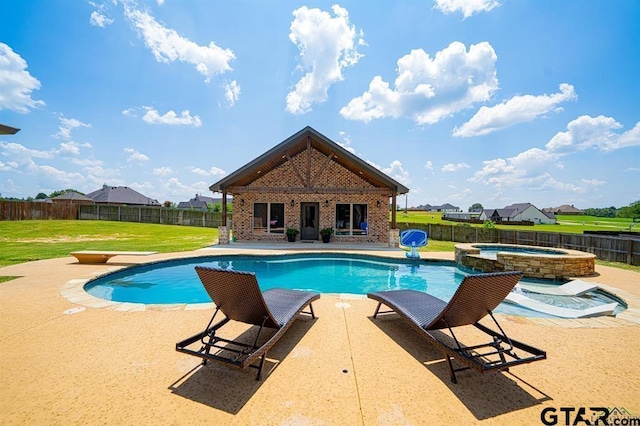 view of pool featuring an outbuilding, a fenced backyard, a yard, a patio area, and an exterior structure