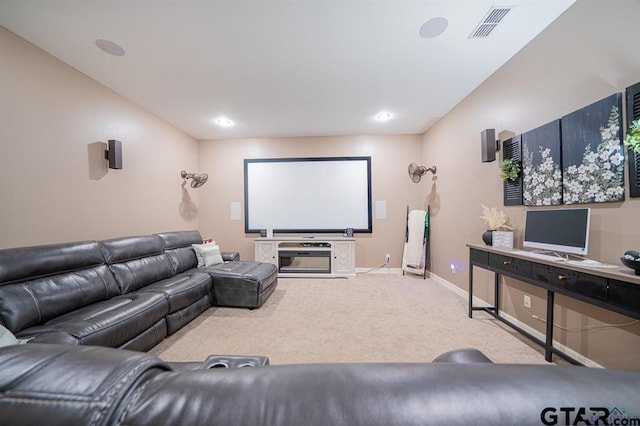 home theater room with carpet floors, recessed lighting, visible vents, and baseboards