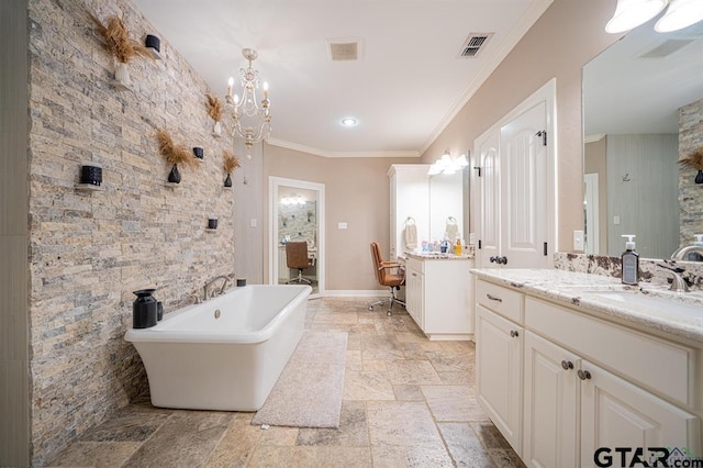 full bathroom with stone tile floors, visible vents, ornamental molding, a freestanding bath, and a sink