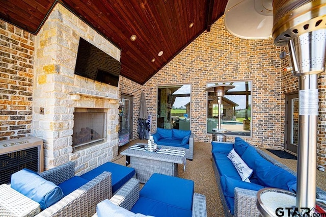 view of patio / terrace featuring an outdoor living space with a fireplace