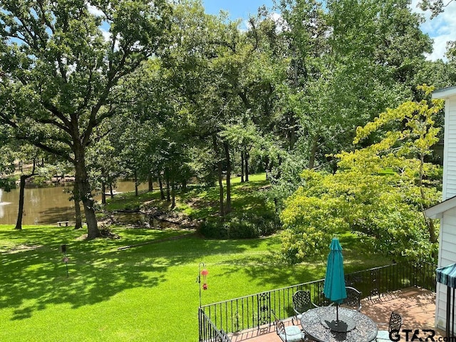 view of yard featuring an outdoor fire pit and a patio area