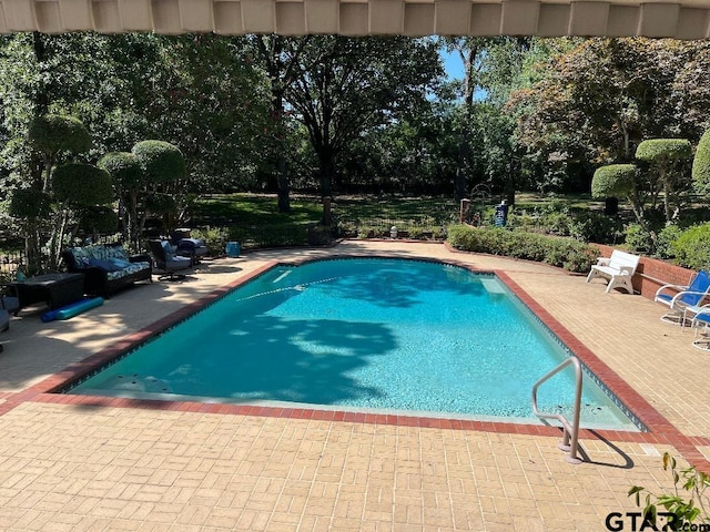 view of pool with a patio