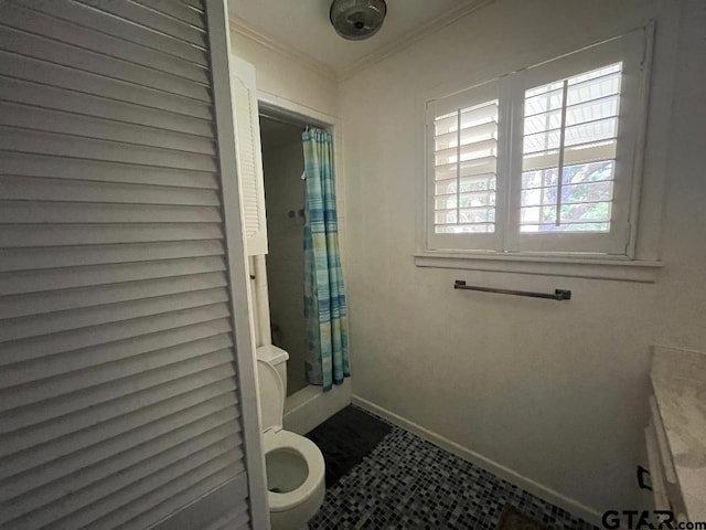 bathroom featuring ornamental molding, vanity, tile patterned flooring, curtained shower, and toilet