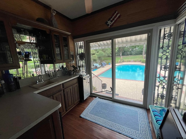 interior space with wet bar and dark hardwood / wood-style floors