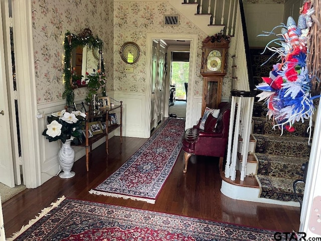 hall featuring dark wood-type flooring