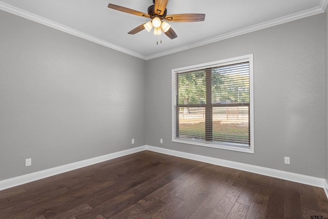 spare room with ceiling fan, dark hardwood / wood-style floors, and crown molding