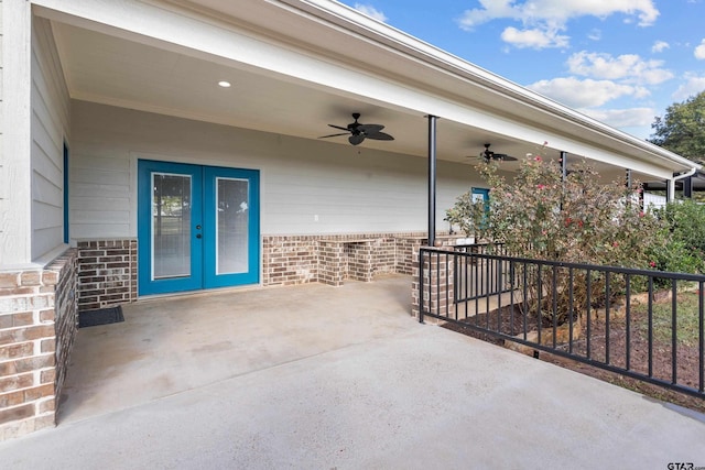 view of patio / terrace featuring ceiling fan and french doors