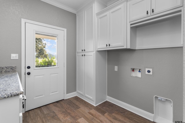 clothes washing area with cabinets, ornamental molding, dark hardwood / wood-style floors, hookup for an electric dryer, and hookup for a washing machine