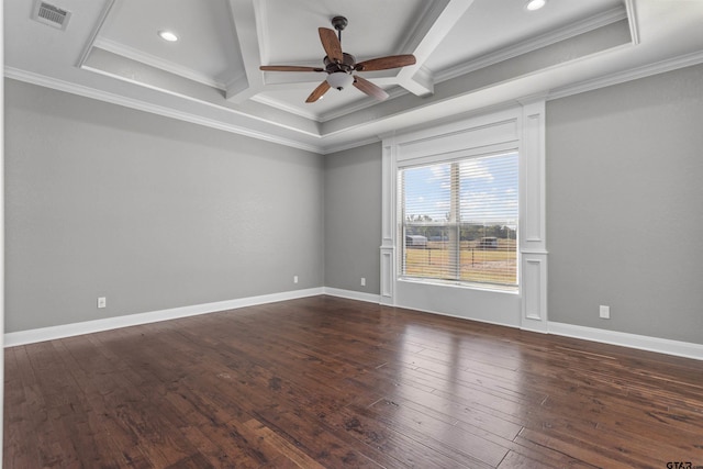 spare room featuring ceiling fan, dark hardwood / wood-style floors, beam ceiling, and ornamental molding