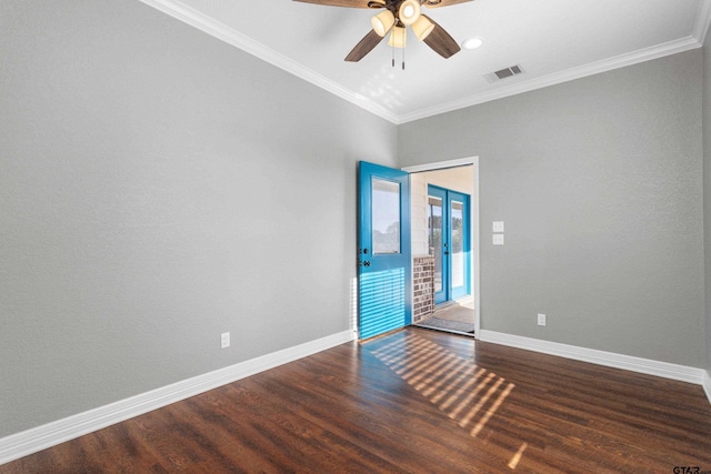 empty room with ornamental molding, dark hardwood / wood-style floors, and ceiling fan