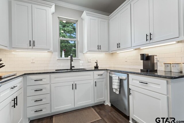 19308 Cedarpark Pl, Lindale, TX 75771 - kitchen featuring dishwasher, white cabinetry, tasteful backsplash, ornamental molding, and dark wood finished floors