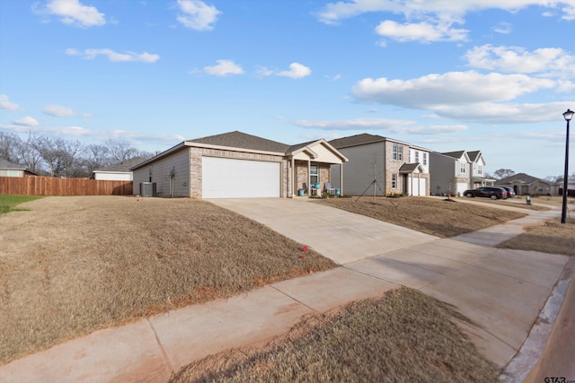 1106 Ripplewood Cir, Chandler, TX 75758 - ranch-style house with central air condition unit, a garage, brick siding, fence, and concrete driveway