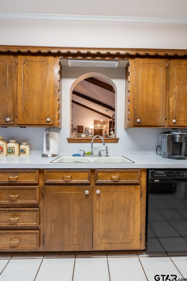 kitchen featuring sink, light tile patterned floors, lofted ceiling with beams, and black dishwasher