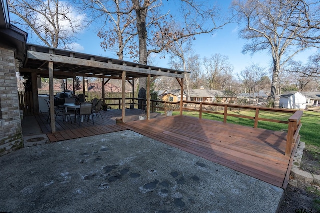 wooden deck with a yard