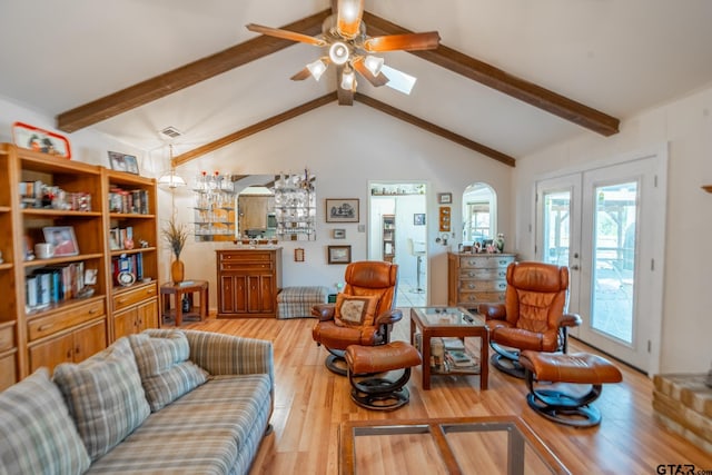 living room featuring hardwood / wood-style floors, lofted ceiling with beams, french doors, and ceiling fan