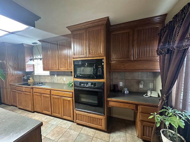 103 Paso Robles Trce, Bullard, TX 75757 - kitchen with black appliances, decorative backsplash, decorative light fixtures, and built in study area