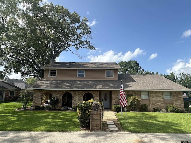 103 Paso Robles Trce, Bullard, TX 75757 - traditional home featuring a front yard, brick siding, and a porch