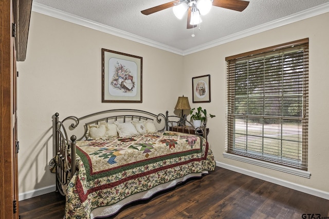 bedroom featuring dark wood-type flooring, ornamental molding, and a textured ceiling