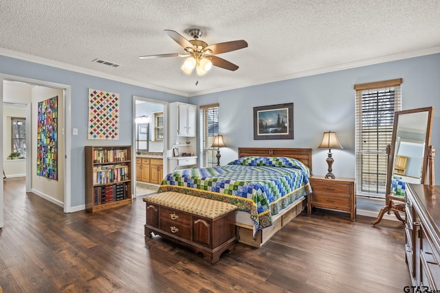 bedroom featuring ornamental molding and dark hardwood / wood-style flooring