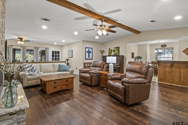 living room with dark hardwood / wood-style floors and vaulted ceiling with beams