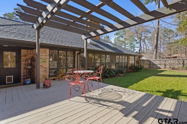 deck with a lawn, fence, and a pergola