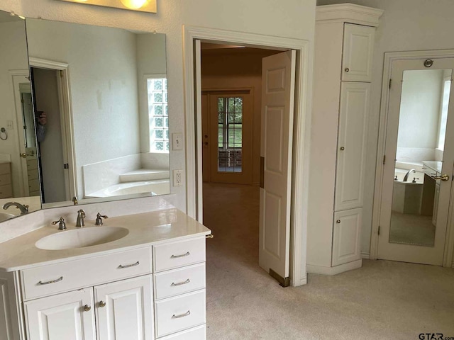 5304 Cedar Creek Dr, Kemp, TX 75143 - full bathroom featuring vanity, a garden tub, and carpet flooring