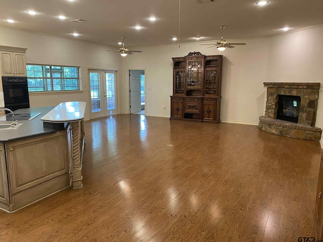 5304 Cedar Creek Dr, Kemp, TX 75143 - living room with a ceiling fan, a fireplace, recessed lighting, and wood finished floors