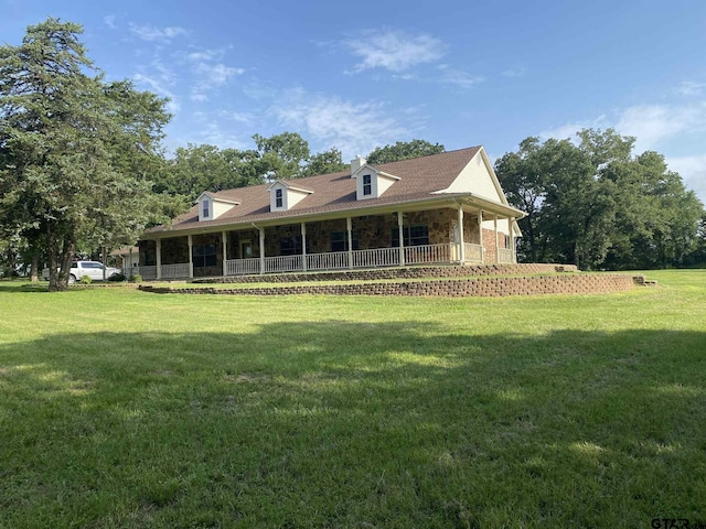 5304 Cedar Creek Dr, Kemp, TX 75143 - back of house with a yard, covered porch, and stone siding