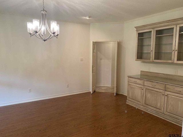 5304 Cedar Creek Dr, Kemp, TX 75143 - unfurnished dining area featuring a chandelier, crown molding, and dark wood-style flooring