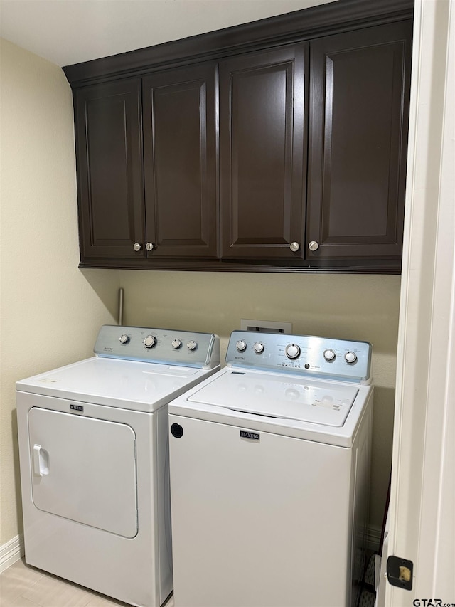 402 E Mims St, Tyler, TX 75702 - laundry area featuring cabinet space and washer and dryer