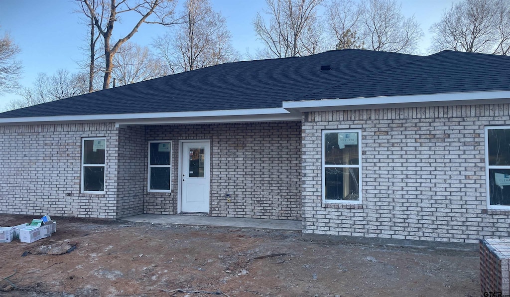 rear view of house with a patio area