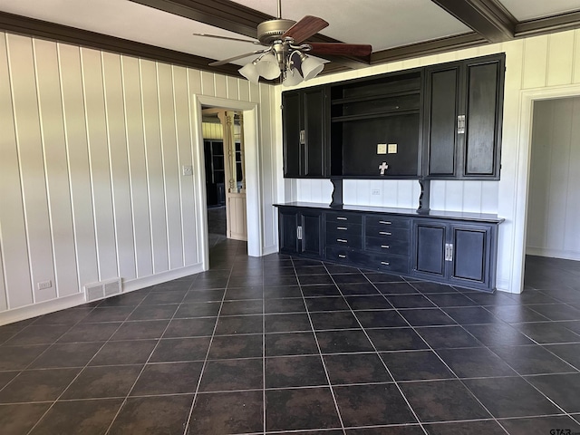 1248 Canada St, Jacksonville, TX 75766 - spare room with ceiling fan, dark tile patterned flooring, and crown molding