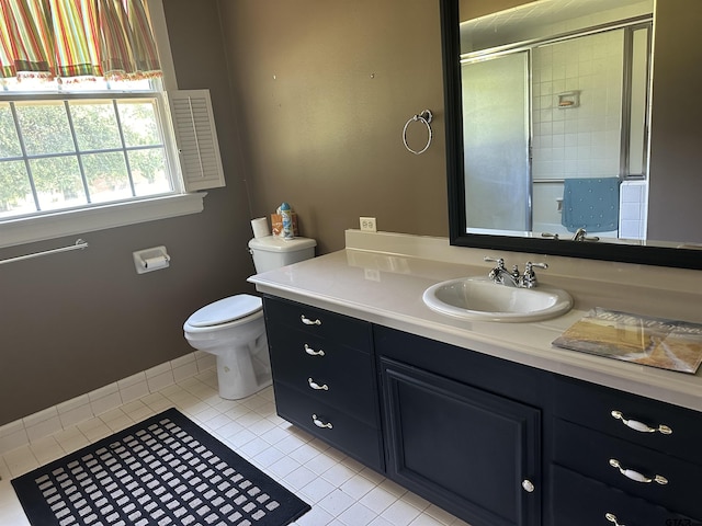 1248 Canada St, Jacksonville, TX 75766 - full bath featuring tile patterned floors, toilet, vanity, and tiled shower