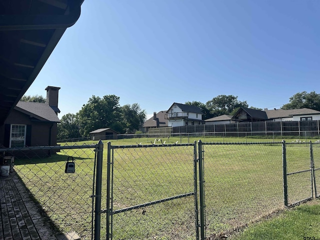 1248 Canada St, Jacksonville, TX 75766 - view of yard with a dog friendly area and a gate
