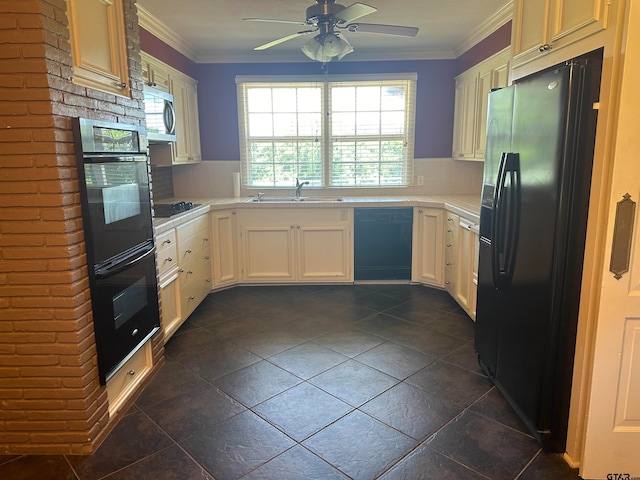 kitchen featuring sink, black appliances, ornamental molding, tasteful backsplash, and white cabinets