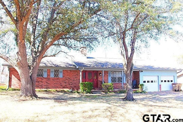 ranch-style house with a garage