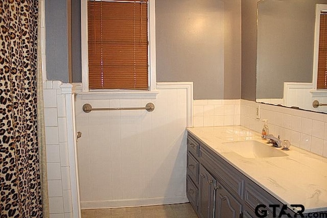 bathroom with vanity and tile patterned floors