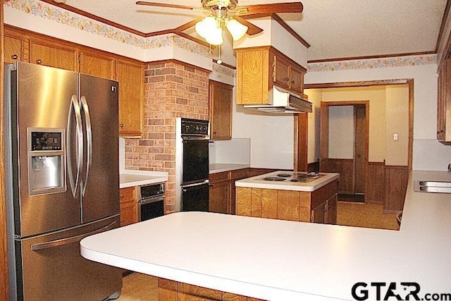 kitchen with stainless steel refrigerator with ice dispenser, kitchen peninsula, white gas cooktop, black double oven, and range hood