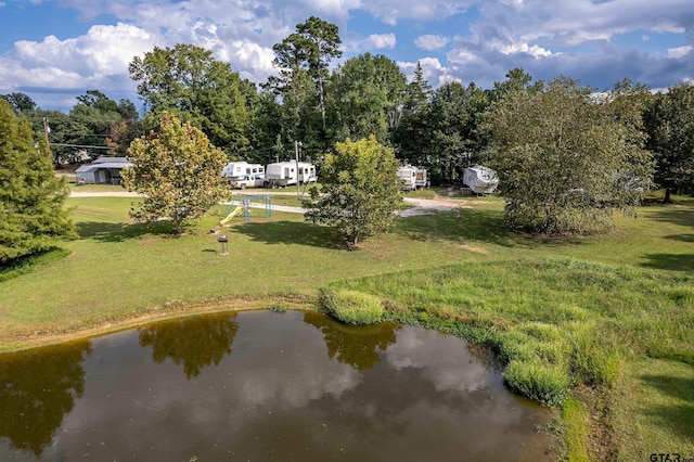 birds eye view of property featuring a water view