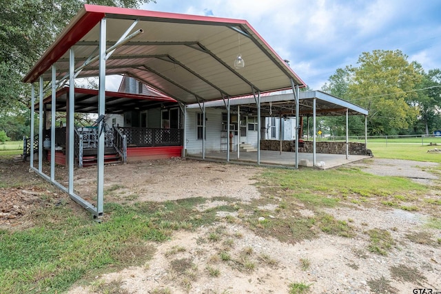 exterior space featuring a carport