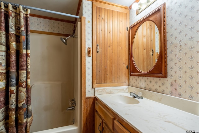 bathroom featuring vanity and shower / bath combination with curtain